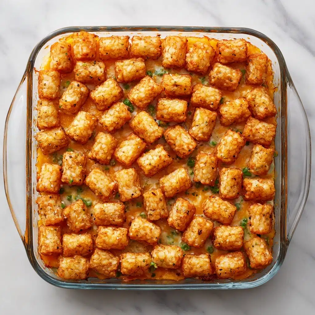 Grease a casserole dish and spread the beef mixture evenly across the bottom Recipe - Recipe Image