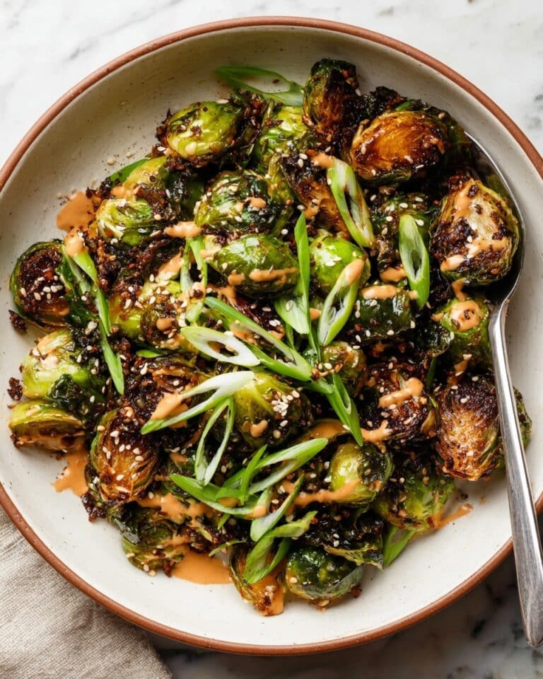 Creamy Sriracha Brussels Sprouts with Scallions and Sesame Seeds Recipe