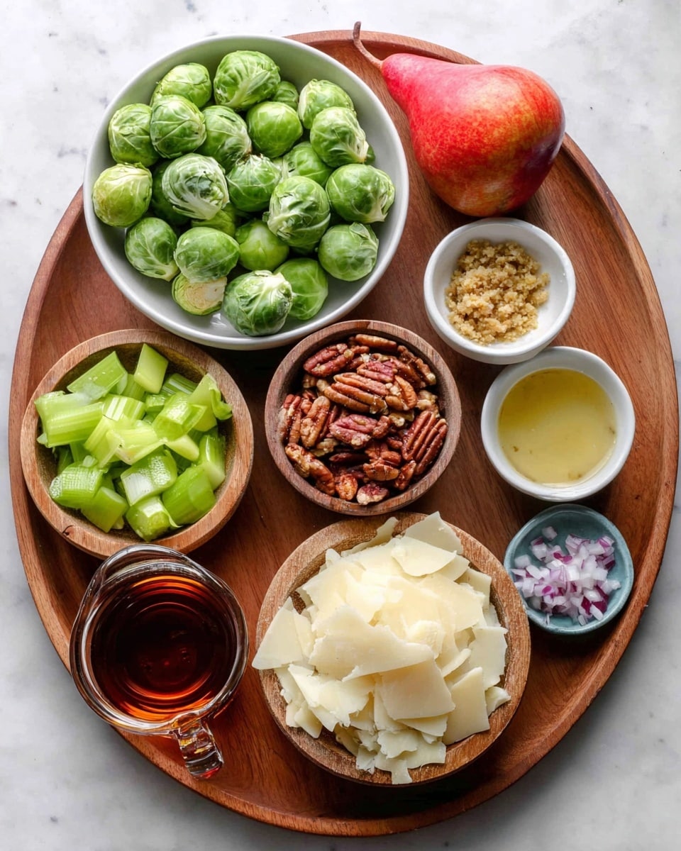 A round wooden tray holds several small bowls with different ingredients arranged neatly on a white marbled surface. At the top left, a white bowl is full of fresh green Brussels sprouts, each with a firm texture and visible leaves. Near the top right on the tray sits a single bright red pear. Just below the pear, a small white bowl contains grainy mustard with a yellow-brown color. To the right of the mustard bowl is another small white bowl filled with a light golden liquid, likely vinegar or oil. In the center, a wooden bowl is piled high with off-white shaved cheese pieces, irregular in size. At the bottom left, a wooden bowl holds crisp, light green sliced celery. Next to it, a small blue bowl contains finely chopped shallots, pale purple and white in color. In front, a clear glass cup is filled with a dark amber liquid, possibly maple syrup or honey. At the left middle edge of the tray, a small white bowl holds roughly chopped pecan pieces with rich brown tones. The overall look is fresh and organized, with a natural mix of textures and colors. Photo taken with an iphone --ar 4:5 --v 7