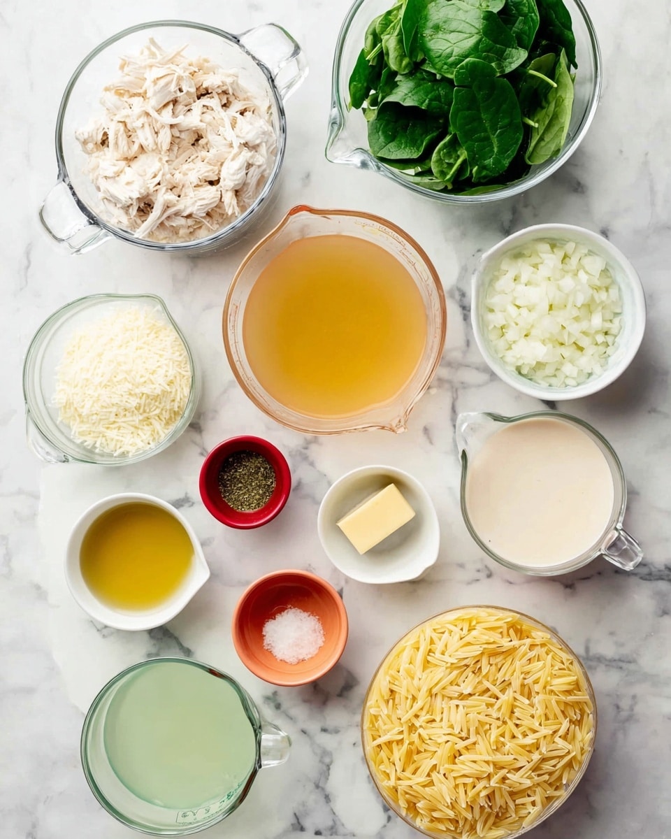 The image shows an overhead view of several clear glass measuring cups and small bowls arranged on a white marbled surface. One cup contains shredded white cooked chicken at the top left. To its right, a cup has fresh green spinach leaves. Below the chicken, there is a cup filled with light golden broth. In the center right, a white bowl holds chopped white onions. A small green bowl near the middle contains minced garlic. A small red bowl has dried herbs, while an orange bowl holds a small cube of pale yellow butter. Below the onions, a small white bowl has a pale green liquid. A glass measuring cup at the bottom left holds grated white cheese, and next to it is a small pink bowl with a golden yellow liquid. Above these, a cup holds uncooked yellowish orzo pasta. Finally, at the bottom right, another glass cup contains a creamy white liquid. All items are spaced evenly with clear visibility of their contents, arranged neatly on the white marbled background, photo taken with an iphone --ar 4:5 --v 7