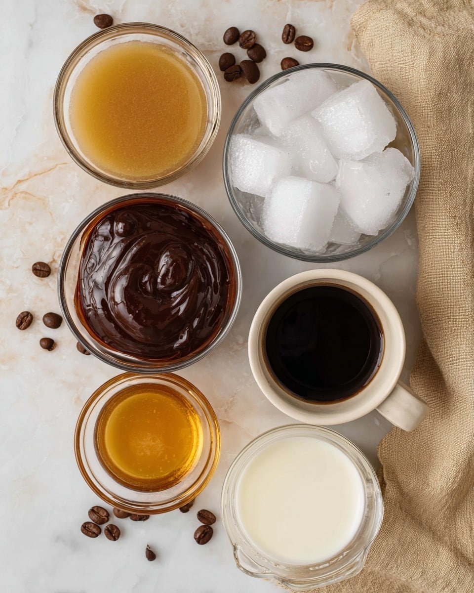 Six clear glass containers of different shapes hold various ingredients arranged on a white marbled surface scattered with a few coffee beans. The top left container holds a smooth, golden honey-colored liquid. To its right, a rounded bowl contains a thick, dark chocolate sauce with swirls on the surface. Below the honey-colored liquid, there is a cup filled with black coffee. In the center right, a measuring cup filled to the top with solid white ice cubes is visible. At the bottom left, a small bowl holds a light amber liquid, and the bottom right features a glass filled with creamy white milk. A beige cloth with texture lies in the upper right corner. photo taken with an iphone --ar 4:5 --v 7