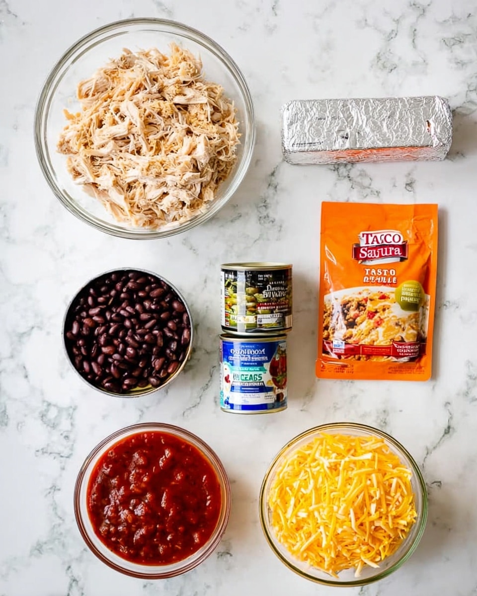 The image shows six food items arranged neatly on a white marbled surface. At the top left, there is a clear glass bowl filled with shredded cooked chicken that is light brown and white. Next to it on the right is a wrapped stick of butter in silver foil. Below the chicken bowl is a can of black beans with a dark label and next to it is a small blue can of green chilies. Below the chili can is a can of red enchilada sauce with a bright red and white label. To the right of all cans, there is a clear glass bowl filled with shredded yellow cheese. Above the cheese bowl is a bright orange packet of taco seasoning mix with a small image of taco meat. The white marbled surface adds clean contrast to all the colorful ingredients photo taken with an iphone --ar 4:5 --v 7