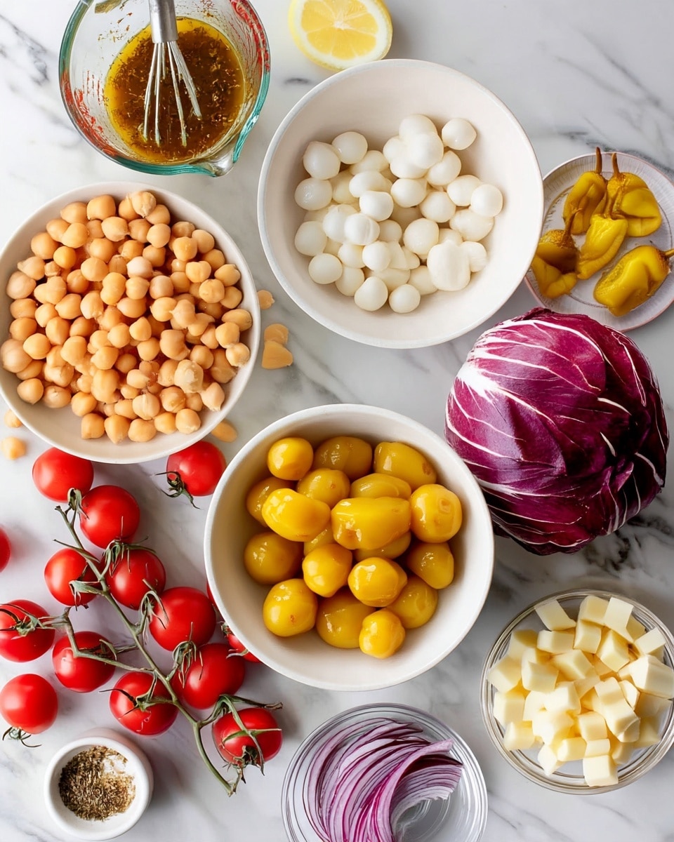 A white bowl filled with round, light beige chickpeas sits near the center left, next to a bunch of bright red cherry tomatoes still attached to green stems lying on a white marbled surface; above the chickpeas is a glass measuring cup with a metal whisk inside, holding a chunky light brown dressing, and next to it lies a half lemon with a pale yellow color. Above the chickpeas is a white bowl with small, smooth, white mozzarella balls. Towards the upper right, a white bowl contains four bright yellow pickled peppers, and below it, a whole round radicchio with deep purple and white streaked leaves. In the lower right corner, there is a clear bowl filled with pale yellow cubed cheese, and beside it, a small clear bowl holds thin slices of purple onion. At the bottom left near the tomatoes, a tiny white bowl contains light green dried herbs. Photo taken with an iphone --ar 4:5 --v 7